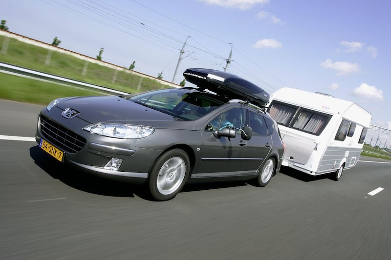 Vakantie Peugeot 407 Break met caravan snelweg